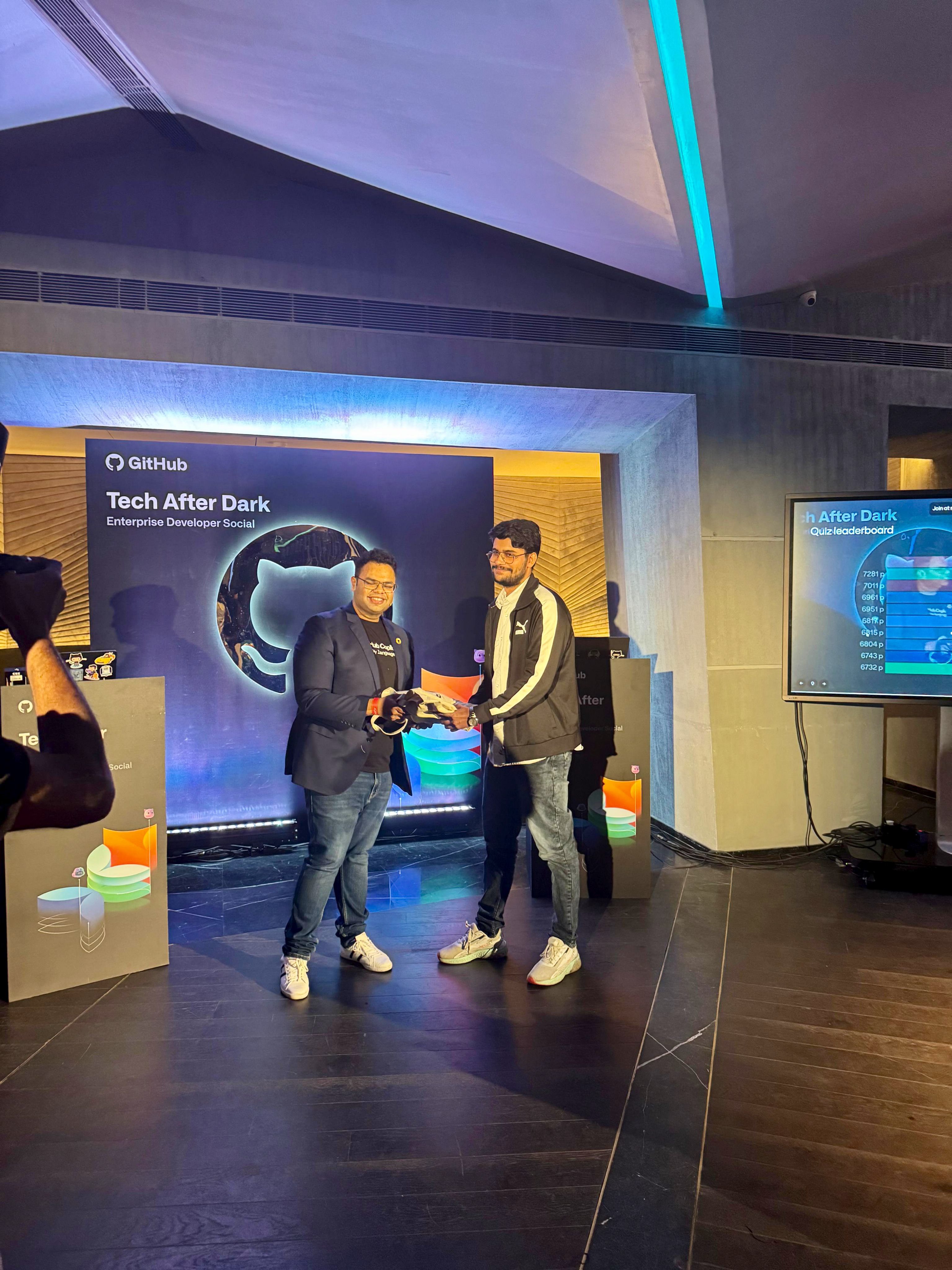 Anshumaan Singh receiving award at GitHub Tech After Dark Enterprise Developer Social event